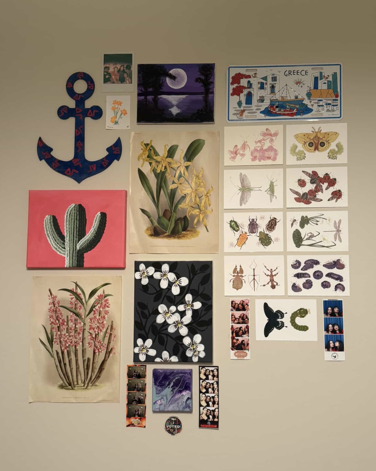 print club among other prints and items on a wall